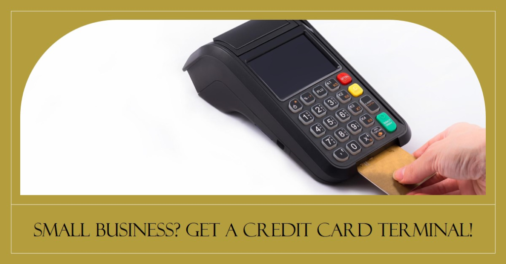 A hand inserting a gold credit card into a black credit card terminal with a red, yellow, and green button keypad.