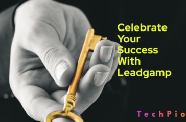 A hand holding a golden key with text overlay that reads “Celebrate Your Success With Leadgamp” on the left side, and the logo “TechPioneer” on the bottom right corner against a black and green gradient background.