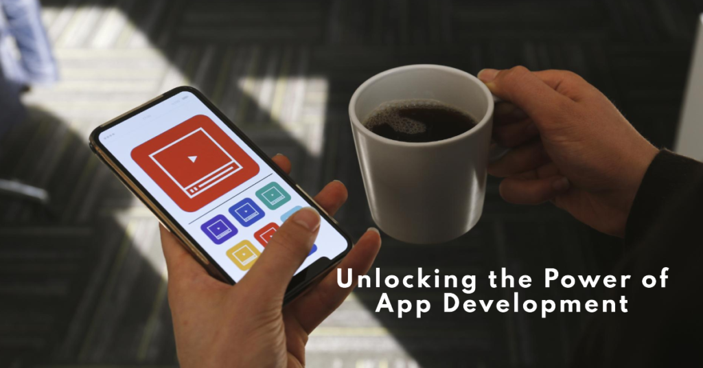 Unlocking the Potential of App Development Services in the Digital Age 5 A person engages in app development, holding a smartphone with apps on display and a coffee cup, symbolizing work-life integration.