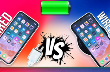 Graphic comparing wired vs wireless charging: On the left, an iPhone connected to a wired charger with the label 'WIRED' in bold red, and on the right, an iPhone on a wireless charging pad with the label 'WIRELESS' in bold blue, all against a vibrant pink and blue gradient background with a dynamic 'VS' in the center symbolized by an ink splash.