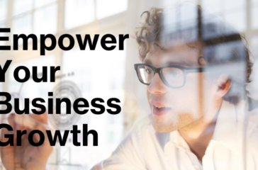 A promotional image featuring a blurred individual in the foreground with glasses and curly hair, looking towards text that reads “Empower Your Business Growth” in bold, black font on a translucent overlay.