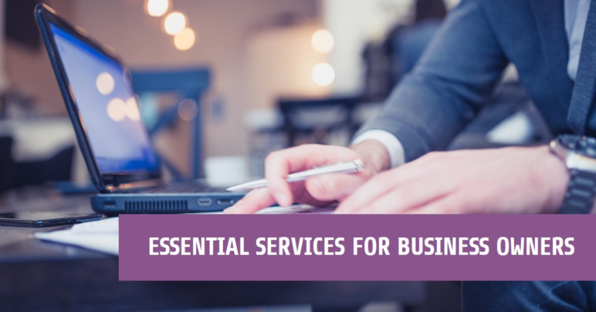 A business professional working at a desk with a laptop and taking notes, with the text “ESSENTIAL SERVICES FOR BUSINESS OWNERS” overlaid.