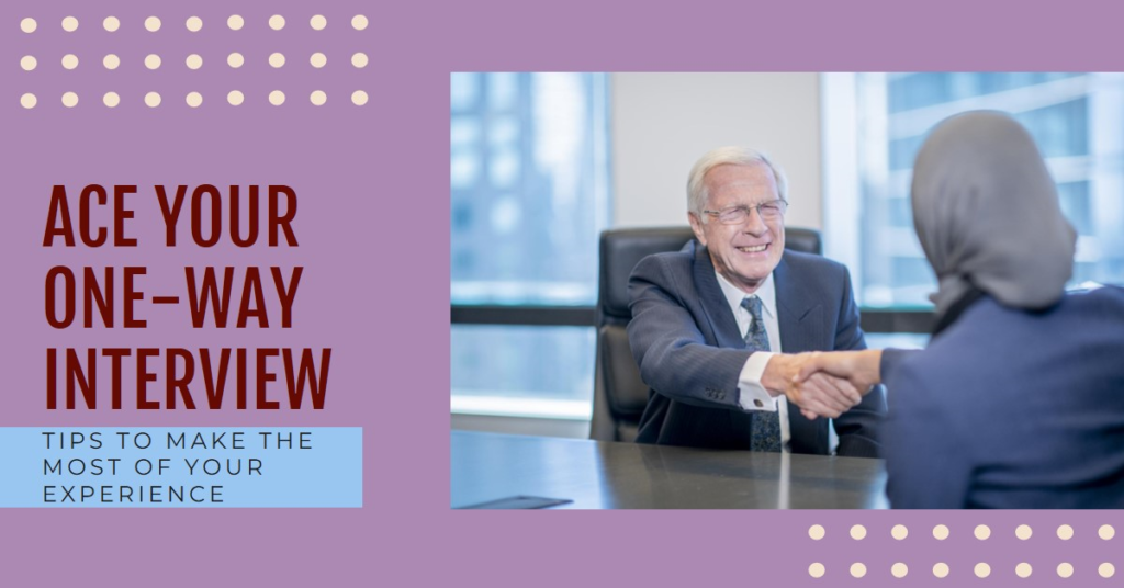 How to Make the Most of Your One-Way Video Interview Experience 6 Two individuals seated at a table in an office setting, engaging in a handshake. One individual’s face is obscured by a privacy block.