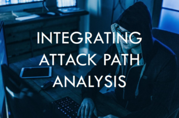 A person wearing a hoodie sitting in front of multiple computer monitors in a dimly lit room with the text “INTEGRATING ATTACK PATH ANALYSIS” overlaid.