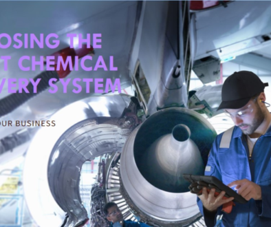 A worker with a pixelated face stands in front of an airplane engine, holding a tablet. Text overlay reads “CHOOSING THE RIGHT CHEMICAL DELIVERY SYSTEM” and “TIPS FOR YOUR BUSINESS.”